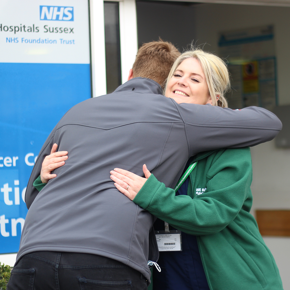 Macmillan Nurse hugging someone