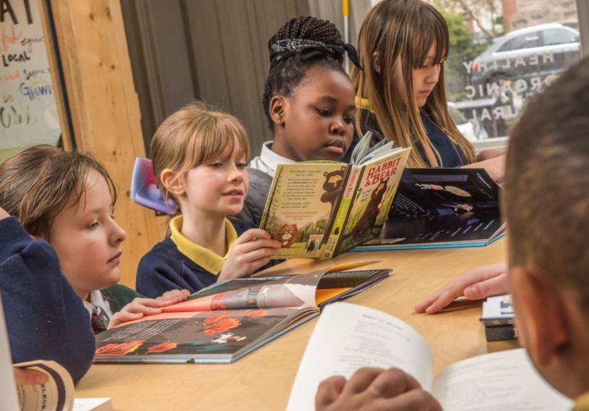 a group of children reading